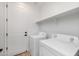 Laundry room with washer, dryer, and overhead shelving at 5320 S Gregor --, Mesa, AZ 85212