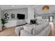 Spacious living room featuring a modern fireplace, comfortable seating, and ample natural light at 9136 N 81St St, Scottsdale, AZ 85258