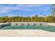 The pristine pool, complete with tiled water features, offers a refreshing escape in a lush, private backyard setting at 9136 N 81St St, Scottsdale, AZ 85258