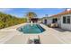 Enjoy resort-style living with this gorgeous pool, BBQ, and lounging area, offering ultimate relaxation and entertainment at 9136 N 81St St, Scottsdale, AZ 85258