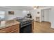 Kitchen view with breakfast bar and stainless steel cooktop oven at 10015 N 14Th St # 10, Phoenix, AZ 85020