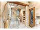 Bathroom features an open walk-in shower with glass door, skylight, and built-in shelving at 1084 N Boulder Dr, Carefree, AZ 85377