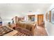 Charming bedroom with Saltillo tile floors, wooden furniture, and tranquil outdoor views at 1084 N Boulder Dr, Carefree, AZ 85377