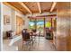 Charming dining area featuring wood ceiling, built-in seating, and scenic views of the outdoors at 1084 N Boulder Dr, Carefree, AZ 85377
