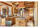 Beautiful kitchen featuring wood cabinetry, granite countertops, and stainless steel appliances, perfect for culinary enthusiasts at 1084 N Boulder Dr, Carefree, AZ 85377