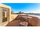 Outdoor terrace with seating, and a view of lush desert vegetation at 1084 N Boulder Dr, Carefree, AZ 85377