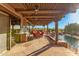 Covered outdoor patio features a built-in barbecue, outdoor kitchen, and pool at 1084 N Boulder Dr, Carefree, AZ 85377