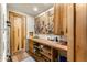Functional work room offers wood cabinets, a large countertop, peg board and wooden door at 1084 N Boulder Dr, Carefree, AZ 85377