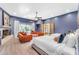 Large bedroom featuring multiple beds and a seating area with cozy couches at 11505 E Cochise Dr, Scottsdale, AZ 85259