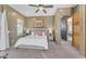 Comfortable bedroom with a plush bed, soft lighting, and serene interior design at 11505 E Cochise Dr, Scottsdale, AZ 85259