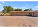 Spacious three-car garage with ample parking and a well-maintained exterior at 11505 E Cochise Dr, Scottsdale, AZ 85259