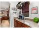 Kitchen counter space with granite countertop, stainless steel appliances, and window at 11866 N 143Rd Ave, Surprise, AZ 85379