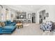 Spacious living room featuring a bar area with pendant lighting and seating at 11866 N 143Rd Ave, Surprise, AZ 85379