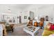 Spacious living room with seamless transition into the dining area, perfect for entertaining at 11866 N 143Rd Ave, Surprise, AZ 85379