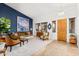 Stylish living room with high ceilings, designer furniture, and abundant natural light at 11866 N 143Rd Ave, Surprise, AZ 85379