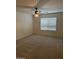 Cozy bedroom featuring a ceiling fan and a window providing natural light at 12848 W Desert Mirage Dr, Peoria, AZ 85383
