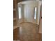 Welcoming entryway featuring tile flooring and natural light from windows at 12848 W Desert Mirage Dr, Peoria, AZ 85383