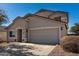 This single Gathering home boasts desert landscaping, a two car garage, and neutral paint at 1370 S 228Th Ln, Buckeye, AZ 85326