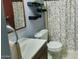 Clean bathroom with a single sink vanity and shower/tub combo at 13830 W Fargo Dr, Surprise, AZ 85374