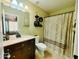 Clean bathroom with granite vanity and updated shower at 13830 W Fargo Dr, Surprise, AZ 85374