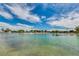 Serene community lake with fountains and recreational areas at 13830 W Fargo Dr, Surprise, AZ 85374