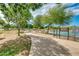 Paved path leads to a community pond and dog park at 13830 W Fargo Dr, Surprise, AZ 85374