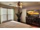 Main bedroom featuring a large TV and ample closet space at 13830 W Fargo Dr, Surprise, AZ 85374