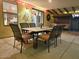 Covered patio with dining area and partial kitchen view at 13830 W Fargo Dr, Surprise, AZ 85374