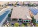 Aerial view of home with tile roof and backyard featuring covered patio at 1808 E Crocus Ave, Queen Creek, AZ 85140