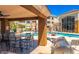 Inviting poolside seating and grilling area for entertaining guests at 18416 N Cave Creek Rd # 1057, Phoenix, AZ 85032