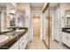 Bathroom featuring double sink vanity, tile flooring, and shower at 1905 E University Dr # 216, Tempe, AZ 85288