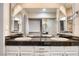 Bathroom featuring double sink vanity and ample storage space at 1905 E University Dr # 216, Tempe, AZ 85288