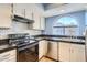 Renovated kitchen with stainless steel appliances and subway tile backsplash at 1905 E University Dr # 216, Tempe, AZ 85288