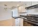 Kitchen with granite countertops and stainless steel appliances, perfect for cooking and entertaining at 1905 E University Dr # 216, Tempe, AZ 85288