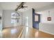 Spacious living room with vaulted ceilings, exposed beam, lots of natural light and hardwood floors at 1905 E University Dr # 216, Tempe, AZ 85288