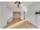 Open living room features sleek hardwood flooring, neutral paint, and lots of natural light at 1905 E University Dr # 216, Tempe, AZ 85288
