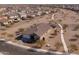 Lovely aerial view of home showcasing desert landscaping, sidewalks, and nearby houses at 34395 N Cherrystone Dr, San Tan Valley, AZ 85144