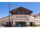 San Tan Heights Center building with a large awning and a well-maintained exterior at 34395 N Cherrystone Dr, San Tan Valley, AZ 85144