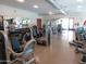 Community gym with modern exercise equipment, mirrors, and natural light at 34395 N Cherrystone Dr, San Tan Valley, AZ 85144
