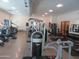 Well-equipped fitness center featuring weight machines, treadmills and free weights at 34395 N Cherrystone Dr, San Tan Valley, AZ 85144