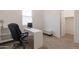 Home office featuring white desk, black desk chair and small storage bench with a window at 34395 N Cherrystone Dr, San Tan Valley, AZ 85144