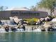 Community entrance featuring a waterfall cascading over rocks spelling out San Tan Heights at 34395 N Cherrystone Dr, San Tan Valley, AZ 85144