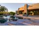 Backyard featuring a pool with rock features, a large patio, and stone accents at 37870 N 98Th Pl, Scottsdale, AZ 85262