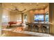 Entertaining game room with a pool table, bar seating and ample space for recreation and relaxation at 37870 N 98Th Pl, Scottsdale, AZ 85262