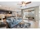 Inviting living room with an open floor plan, seamlessly connecting to the kitchen and dining area at 3833 E Stiles Ln, Gilbert, AZ 85295