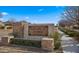 Elegant stone entrance sign for the Legacy at Seville community by Toll Brothers at 3882 E Andalusia Ave, Gilbert, AZ 85298