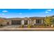 Charming home featuring well-maintained landscaping, a paved driveway, and a two-car garage at 3882 E Andalusia Ave, Gilbert, AZ 85298