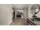 Elegant foyer with light wood flooring, recessed lighting, and modern decor at 3882 E Andalusia Ave, Gilbert, AZ 85298