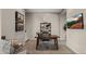 Comfortable office space with a wooden desk, soft carpet, and modern decor at 3882 E Andalusia Ave, Gilbert, AZ 85298