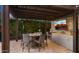 Outdoor kitchen with a grill and entertainment area at 3882 E Andalusia Ave, Gilbert, AZ 85298